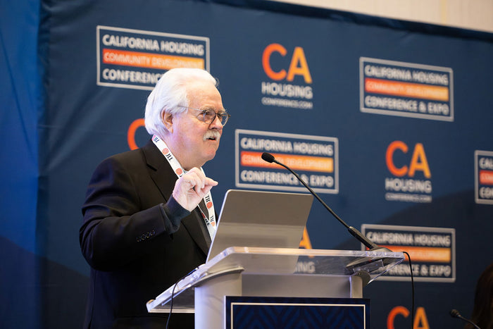 A speaker at the 2025 California Housing & Community Development Conference