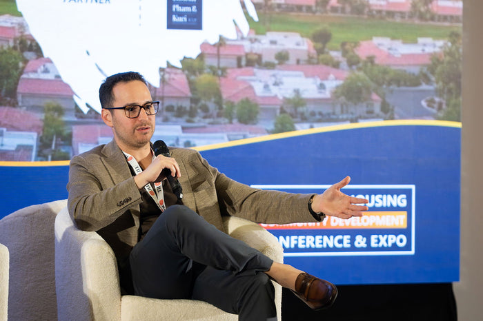 A speaker at the 2025 California Housing & Community Development Conference
