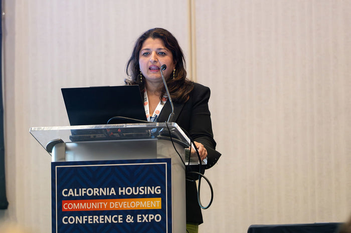 A speaker at the 2025 California Housing & Community Development Conference