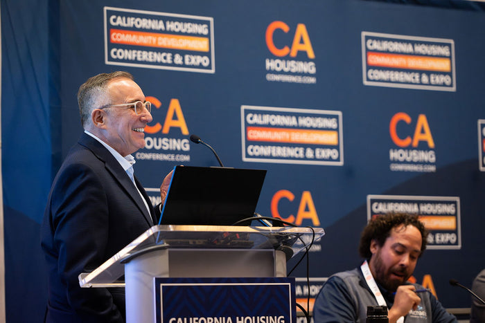 A speaker at the 2025 California Housing & Community Development Conference