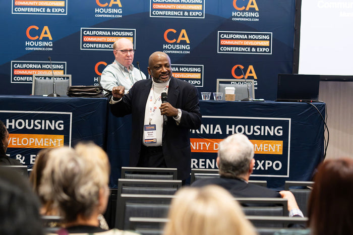 A speaker at the 2025 California Housing & Community Development Conference