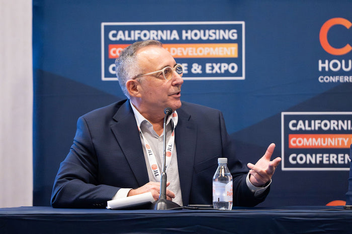 A speaker at the 2025 California Housing & Community Development Conference